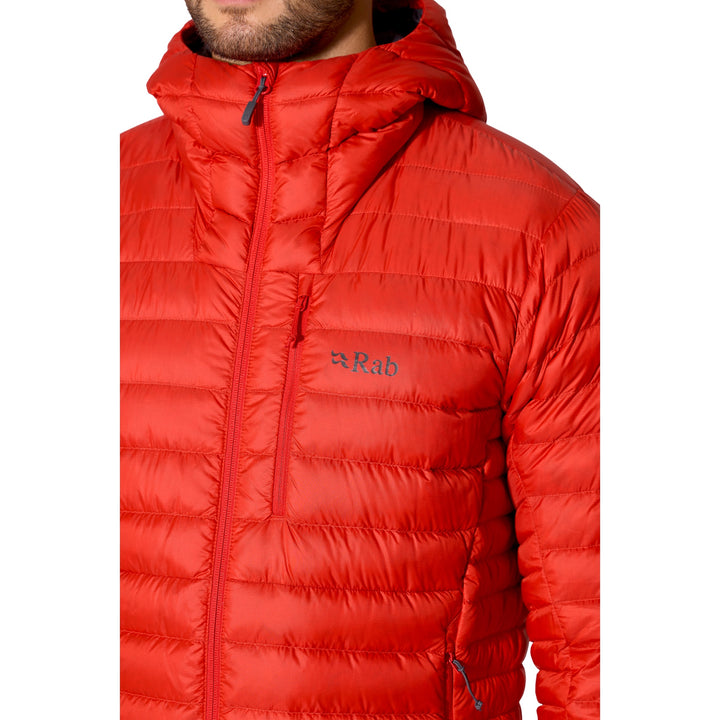 Close-up of the chest baffles and front zip on the Rab Microlight Alpine Down Hoody in Dark Horizon.