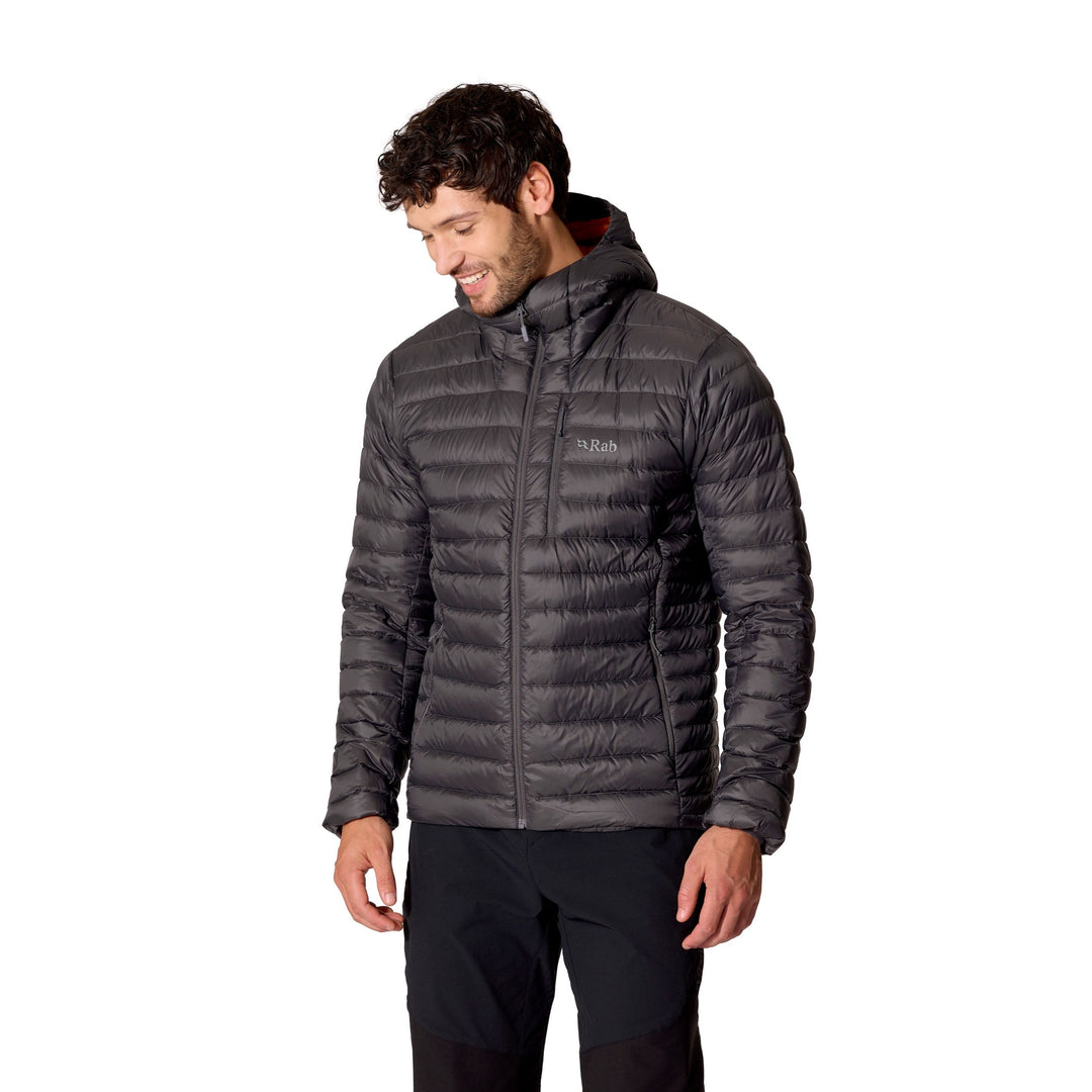 Man wearing the Men’s Rab Microlight Alpine Down Hoody in Graphene, three-quarter front fit view.
